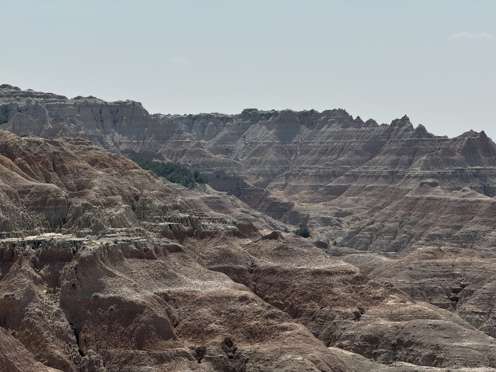 The Grand Canyon National Park presents dramatic cliffs and layered rock formations.