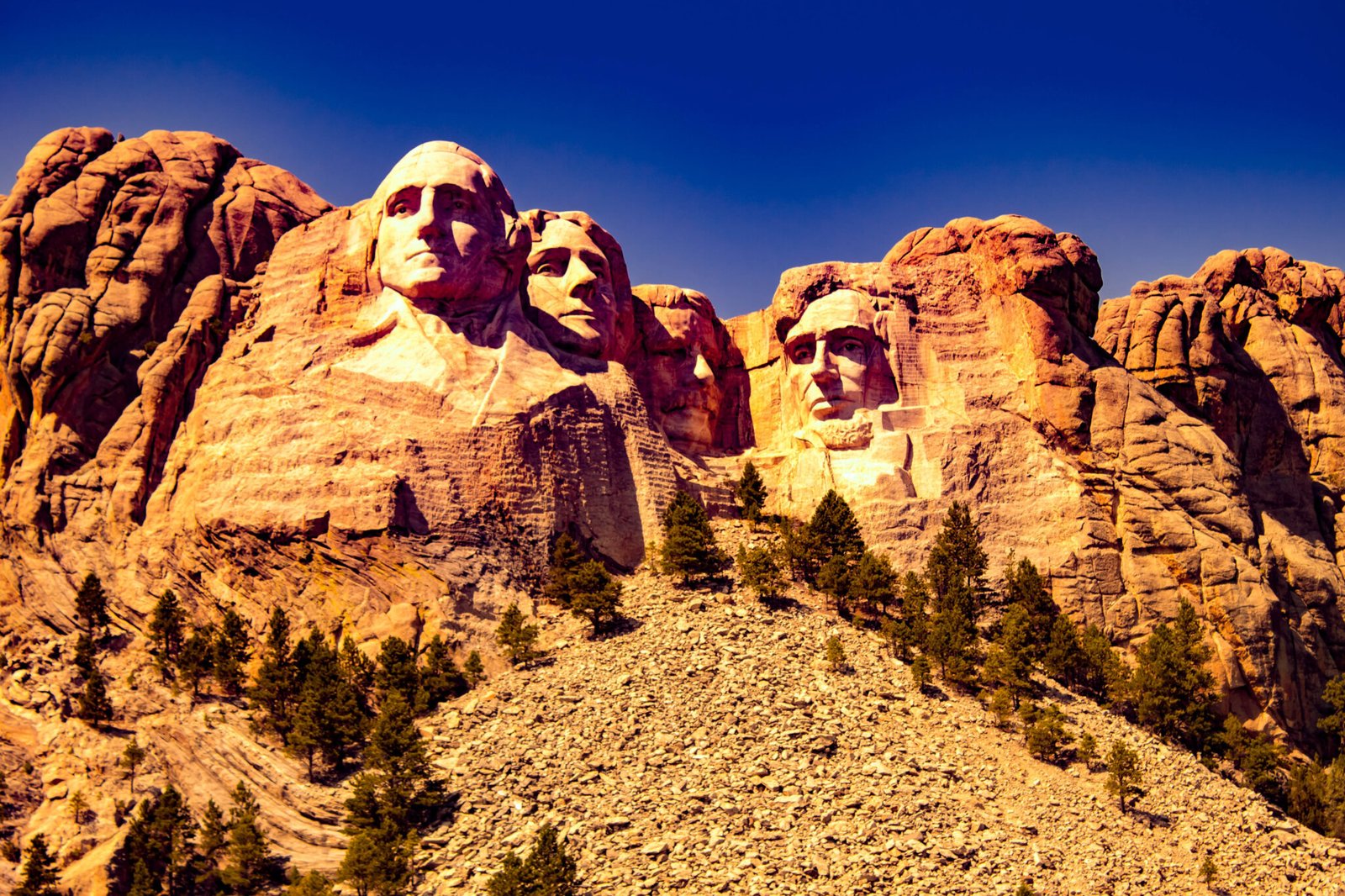Mount Rushmore front view , expressive edition , purple sky , golden mount . Background